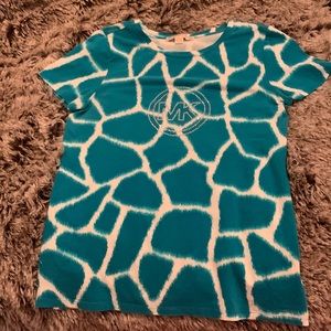 This is a Michael Kors T-shirt size medium excellent condition